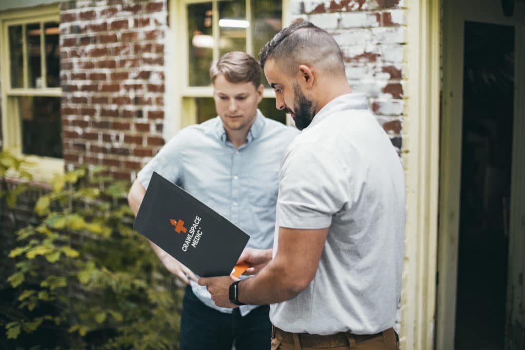 crawl space inspection review with client
