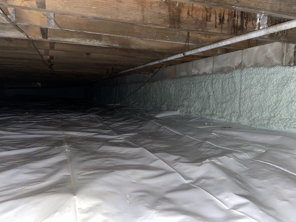 spray foam insulation on a crawl space wall
