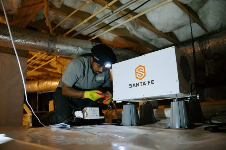 Smart crawl space dehumidifier installed beneath historic home
