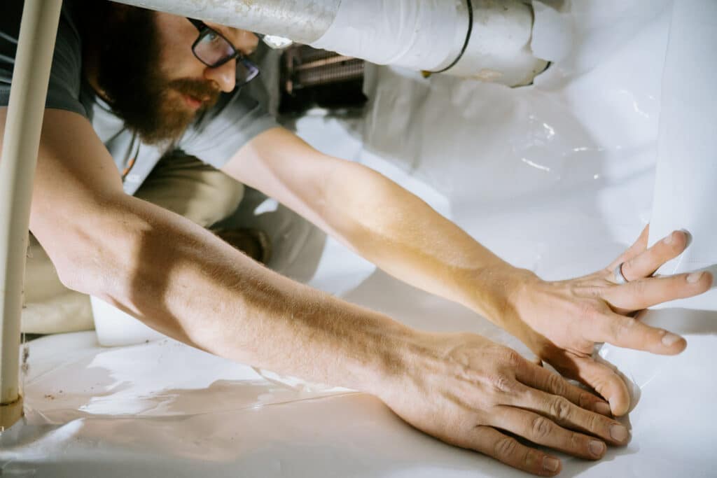 Crawlspace Medic technician at work — serving Nixa Missouri crawl space customers